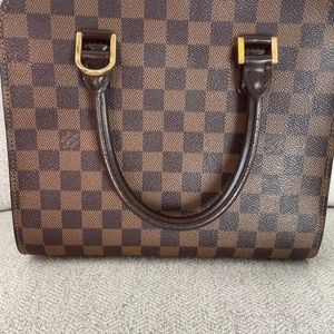 Louis Vuitton Triana Handbag
